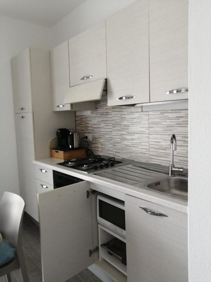 Апартаменты Residenza Le Maree Мурта-Мария Экстерьер фото